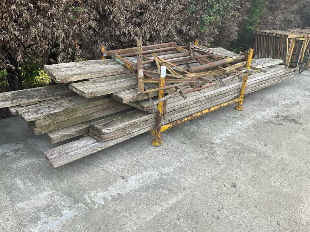 batch of construction trestles and wooden beams
