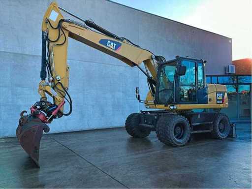 Caterpillar - 2014 - M313D - Banden graafmachine