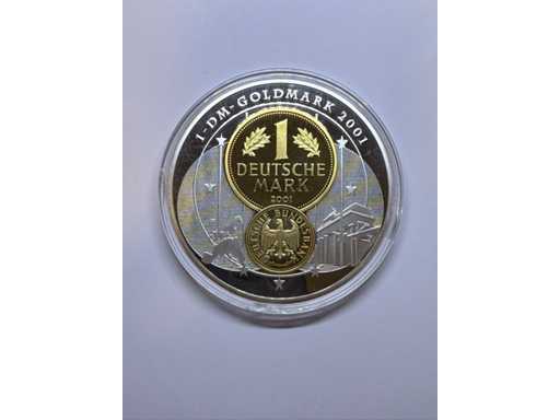 Monedă comemorativă de 10 ani de rămas bun de la marca germană