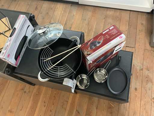 gietijzeren wok , gietijzeren serveerpan,inox sauskommetjes met warmer