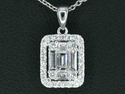 Wisiorek z białego złota z diamentami i szmaragdowym kształtem