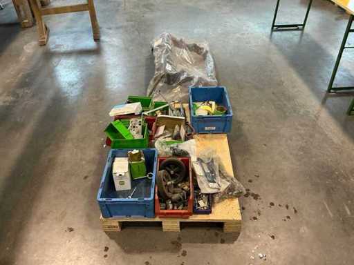 Bundle of spare parts and assembly material