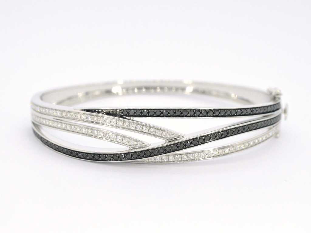 Witgouden design armband met witte en zwarte briljanten diamanten
