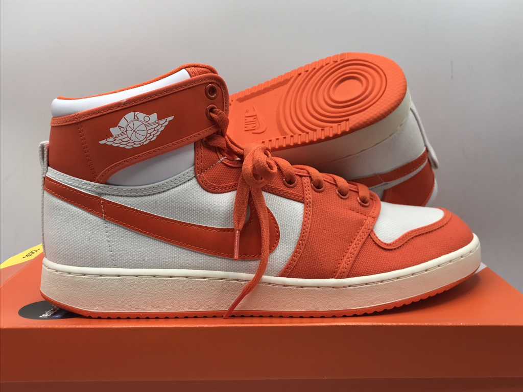 Nike Ajko 1 Rush Sneaker in Orange/Weiß 46