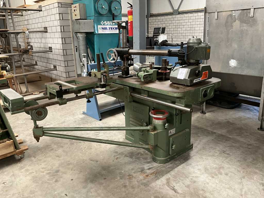 Kölle Single-axis milling table with walk-through device