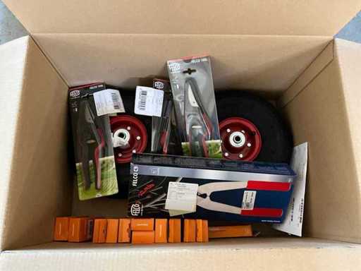 Multiple garden tool accessories.