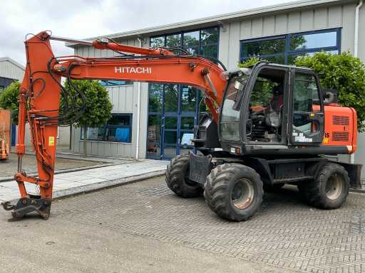 2010 Hitachi ZX140W-3 Banden graafmachine