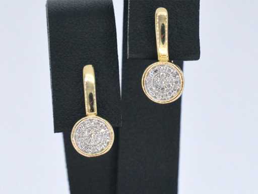 Gold earrings with diamond