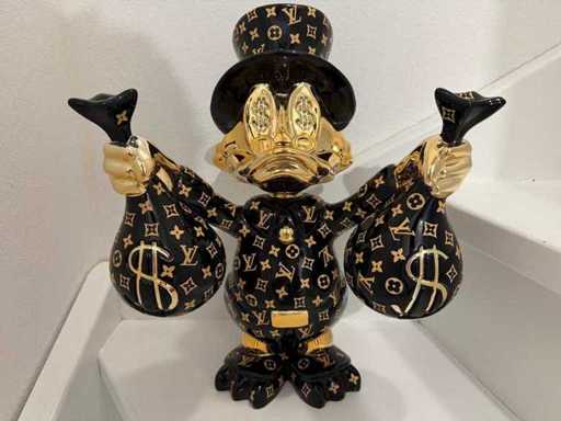 Sculptura lui Louis Vuitton Scrooge McDuck