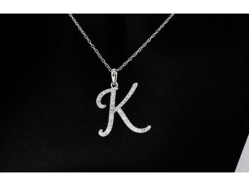 Pendant with real natural diamonds in the letter K