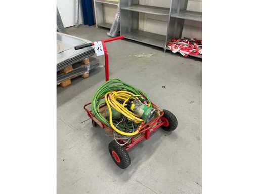 Transportkar met slangen en dompelpomp