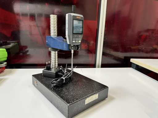   Support de mesure avec comparateur