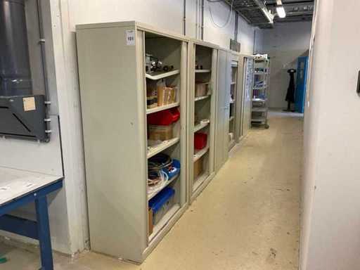 Batch of cabinets and warehouse racks with contents