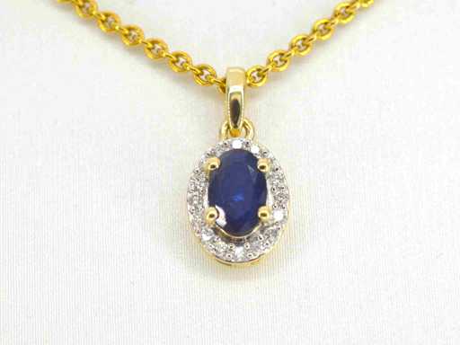 Gouden entourage hanger met diamanten en saffier