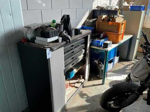 File cabinet and table with contents