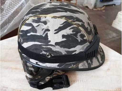 Vintage green camouflage motorcycle helmet