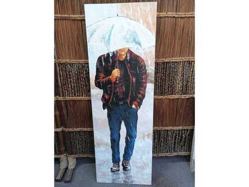 Boy painting in the rain
