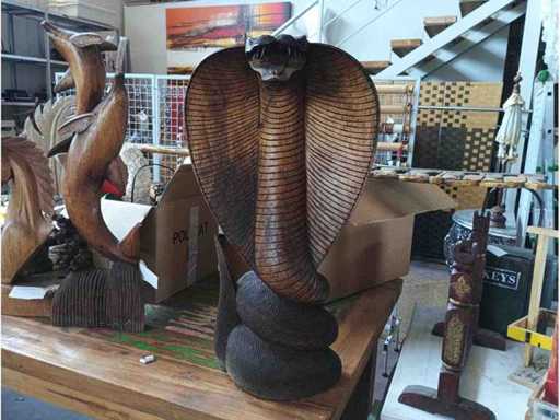 Hand-carved python statue