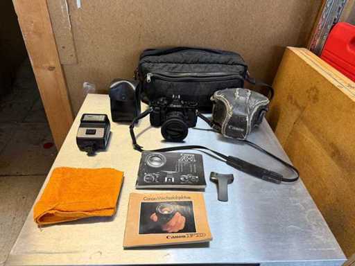Camera ? CANON A1? Analogue SLR camera with Canon flash unit and FD 50 mm 1.4