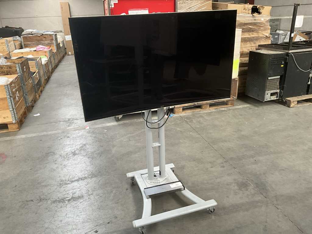 Curved TV on stand with interface