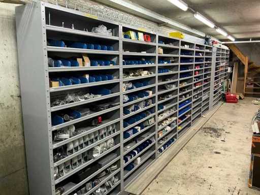 Batch of parts for machine construction in steel compartment cabinet (13x)