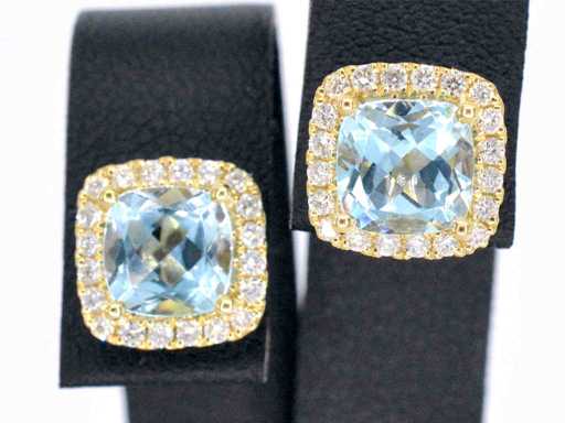 Gouden entourage oorbellen met topaas en diamanten