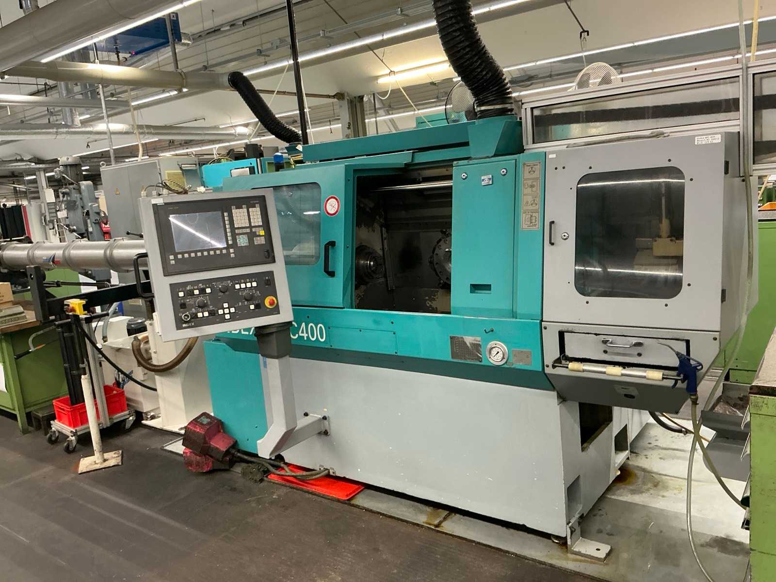 INDEX MC400 CNC lathe with bar feeder
