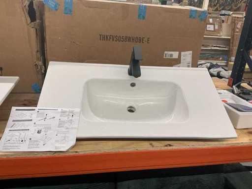 Wastafel met kraan