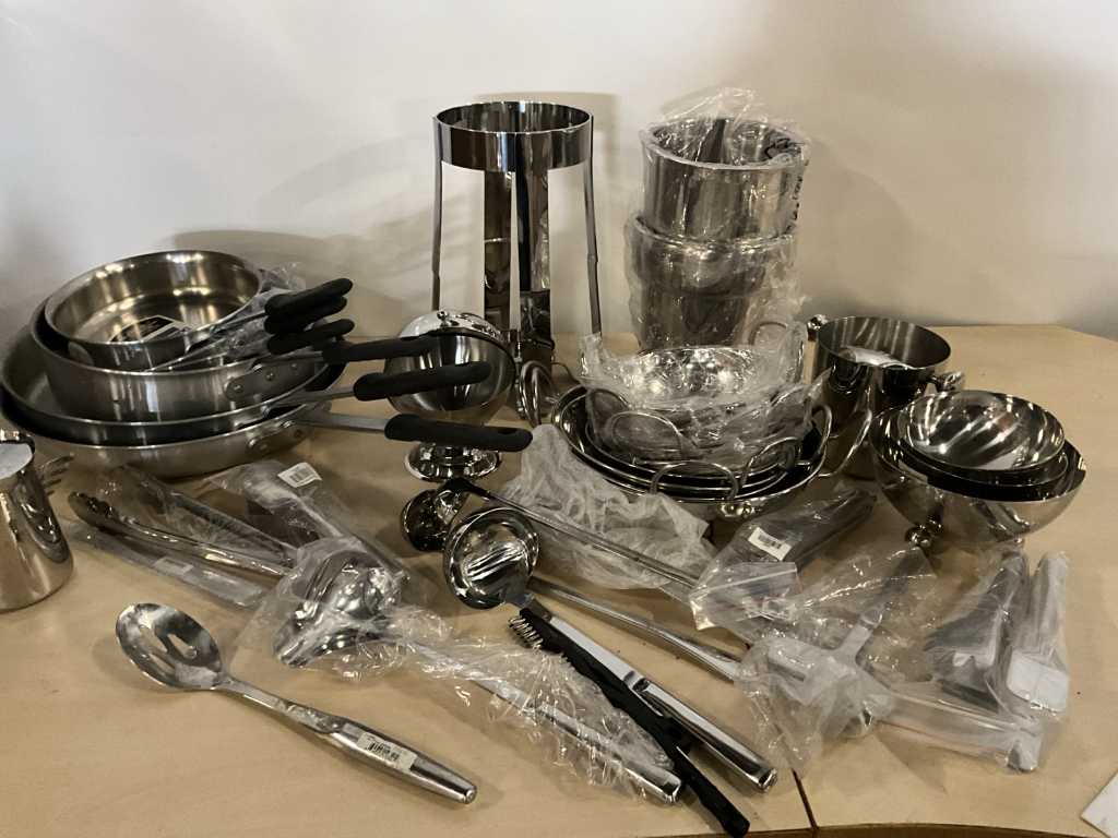 Various stainless steel Dura-Ware pans and kitchen accessories