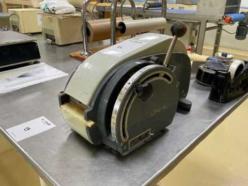 Dyspenser taśmy UNI-90