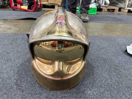 Firefighter helmet G.D. Luxembourg – chrome-plated, with visor & neck protection (used)