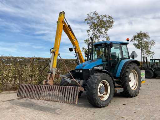 1998 New Holland TS100 Tracteur agricole à quatre roues motrices avec bras de tonte forestière