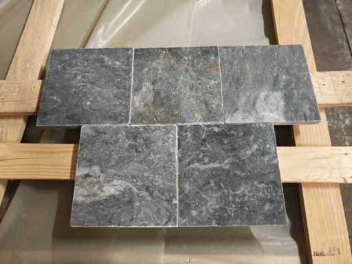 Natural stone tiles and washbasins