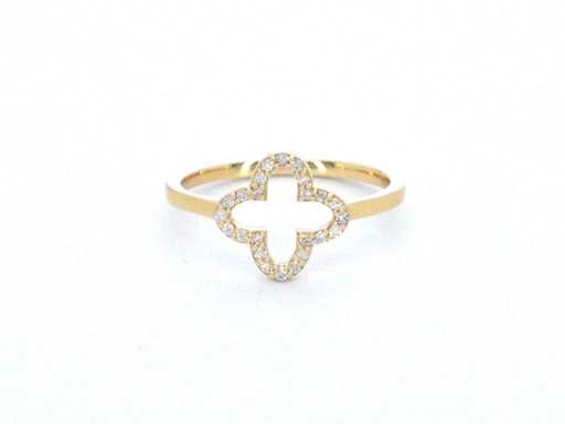 Motif de quatre anneaux en or avec quatre diamants