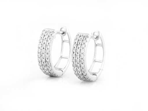 Boucle d’oreille en or blanc 14 nuds avec diamant naturel