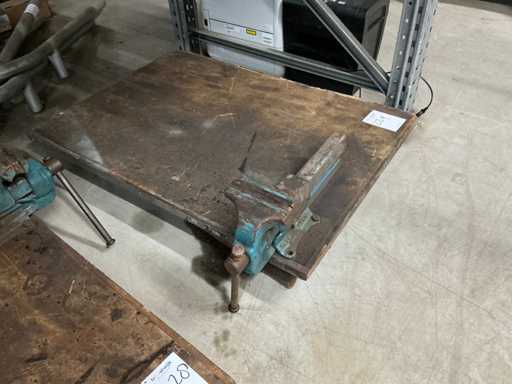 Folding work table with vice