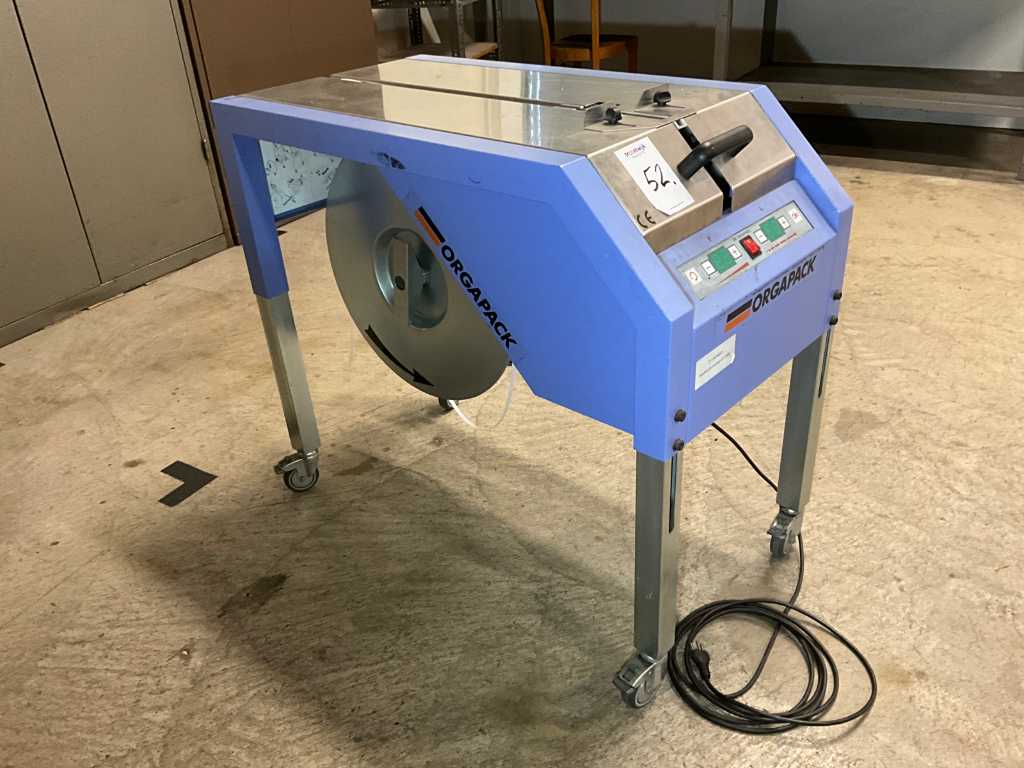 2002 Orgapack CT 2800 strapping apparatus with plastic strap