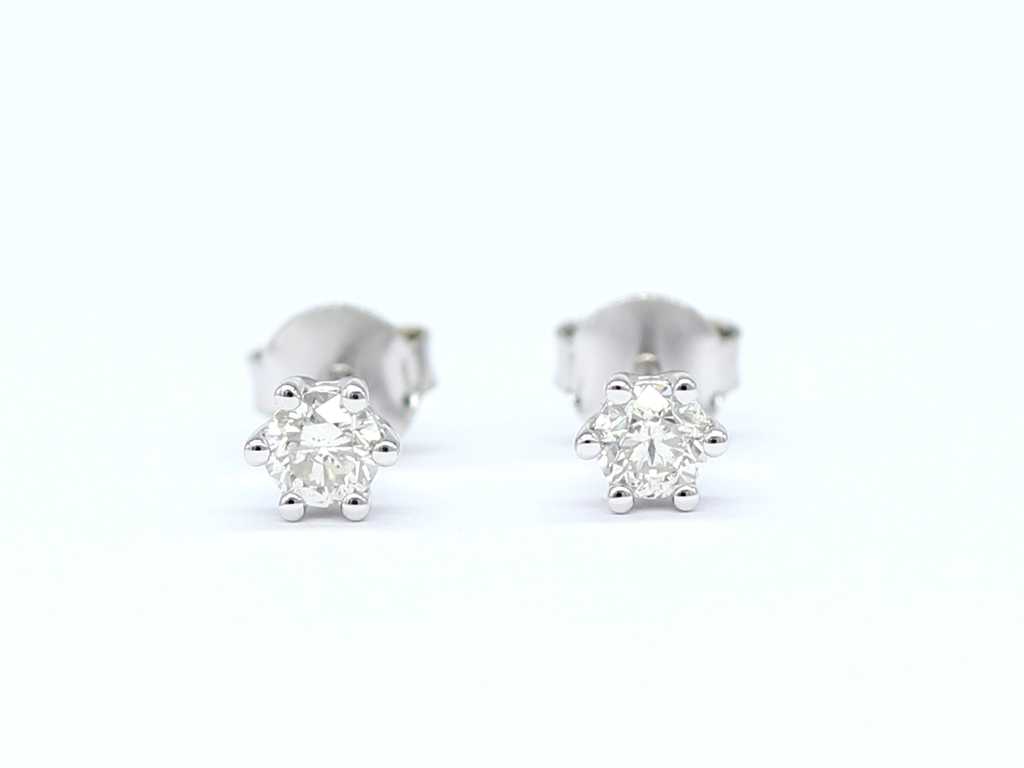 Boucle d’oreille en or blanc 18 carats avec diamant naturel de 0,62 carats