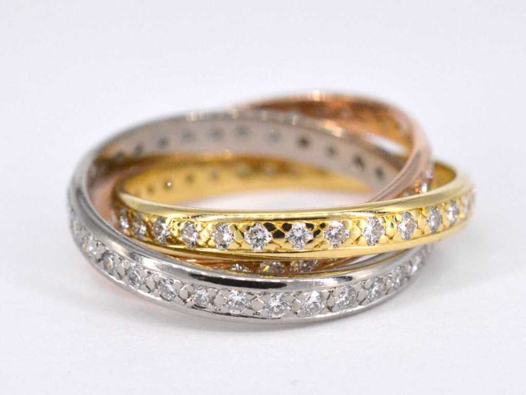 Trinity ring with three colors of gold and diamonds