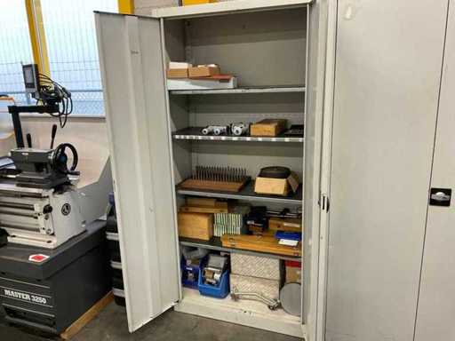 Cabinet with measuring tools