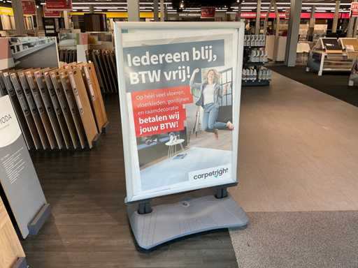 Pavement sign with 2 flags