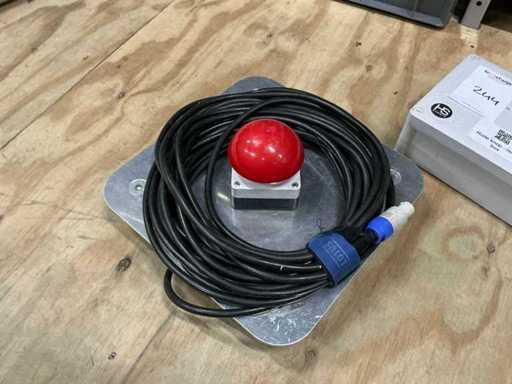 Red button on base plate with relay box