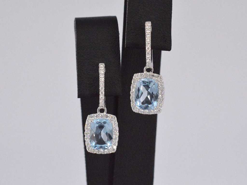 Boucles d’oreilles entourage en or blanc avec grosses topazes et diamants