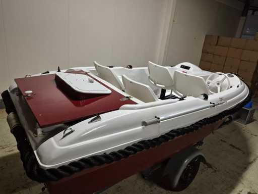 Console boat and fishing boat with inboard motor and tilting trailer