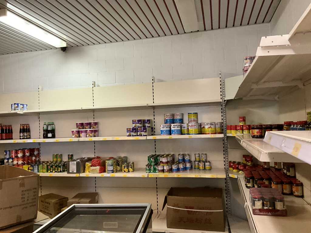Large batch of various food products in retail space