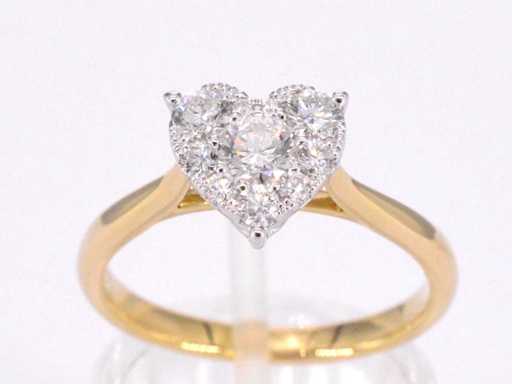 Gold ring with diamonds in heart shape