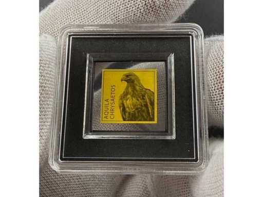 Edle Sammlermünze aus 999/1000 Feingold mit kunstvoll graviertem Steinadler und offizieller Wertangabe 3000 Francs CFA