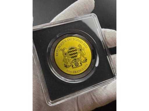 Finely crafted gold coin with historical portrait of a woman and high minting quality 1/200 oz