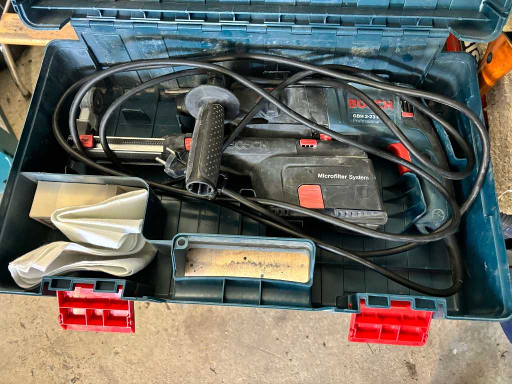 Impact drill with vacuum cleaner Bosch GBH 2/23 REA