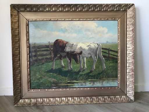 Peinture à l’huile sur toile. Des veaux dans le pâturage. Signé.